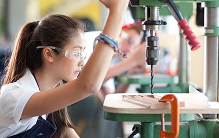 Girls in tailoring class